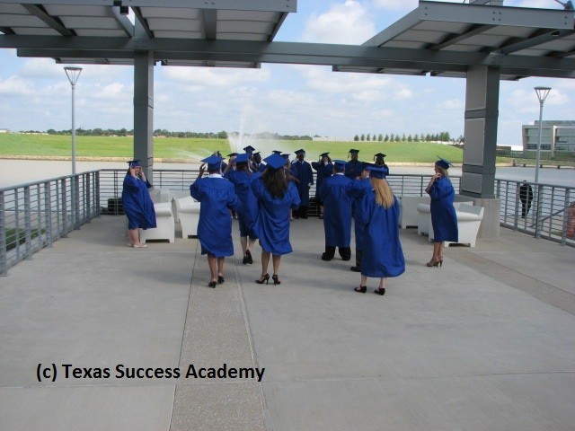 Texas Success Academy Studetns walking to take their class photo